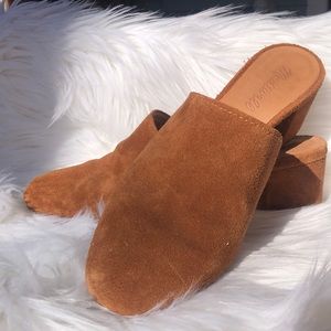Madewell brown suede mules.